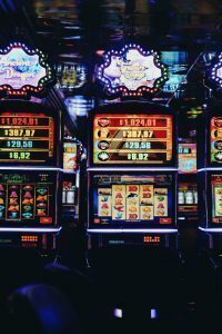 pokie machines in a dark casino environment